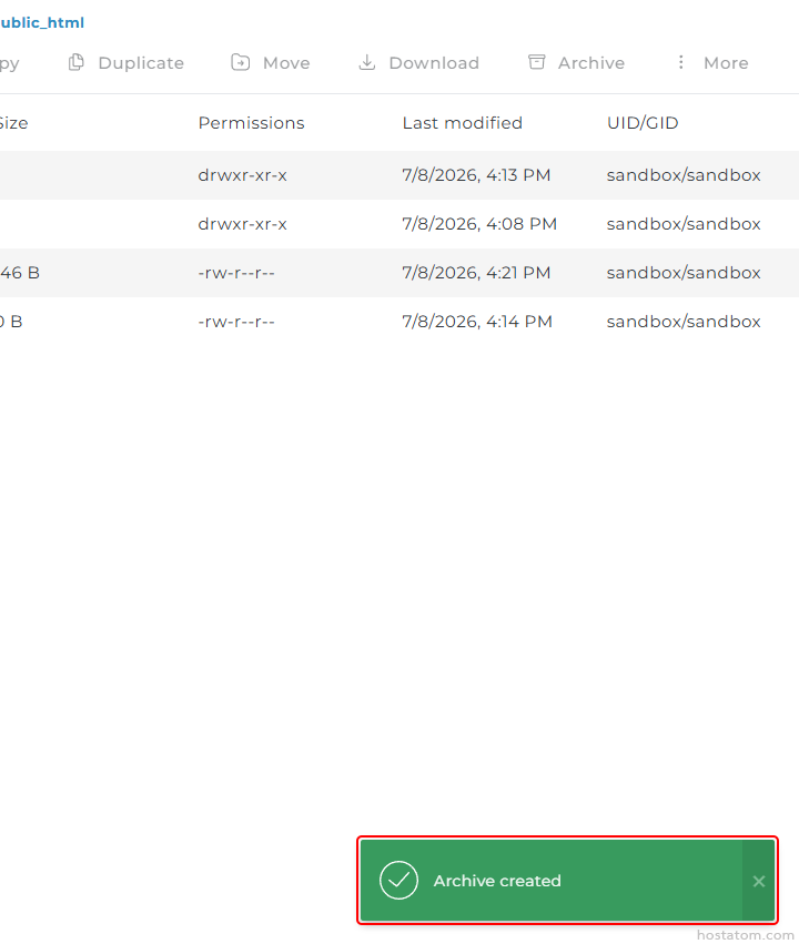 File manager listing sandbox contents with permissions and dates; green 'Archive created' success toast at bottom-right.
