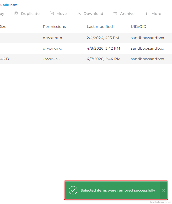 File manager showing three items in sandbox/sandbox with permissions and dates; green success toast at bottom reads 'Selected items were removed successfully'