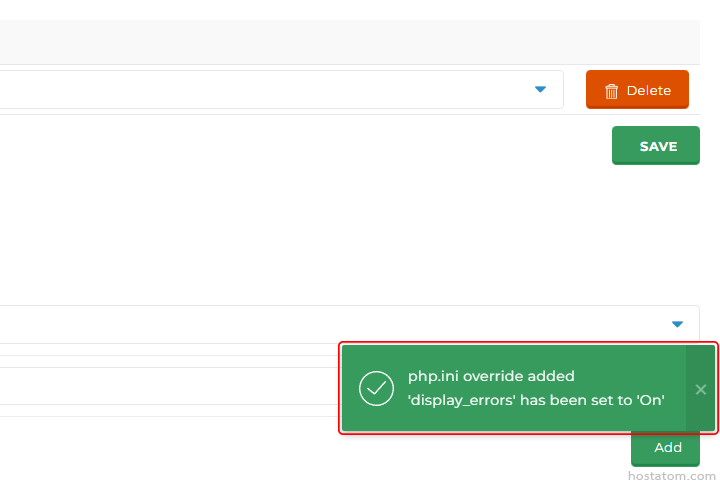 Green success toast: "php.ini override added; 'display_errors' set to 'On'" appearing bottom-right over a form with Save/Delete controls