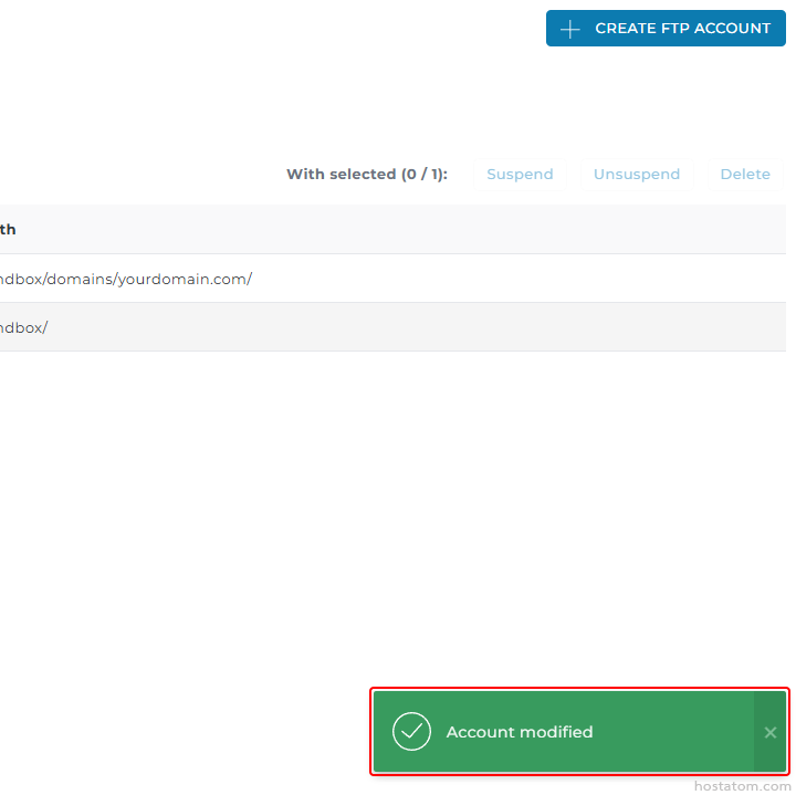 Web admin panel for FTP accounts showing a green success toast labeled 'Account modified' at bottom-right, with a blue 'Create FTP Account' button at top-right and action options across the bar.