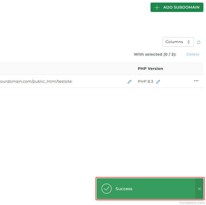 Green Success banner with a checkmark at the bottom of the screen; the UI shows a subdomain management panel with an Add Subdomain button and a row listing a domain with PHP 8.3 as the version.
