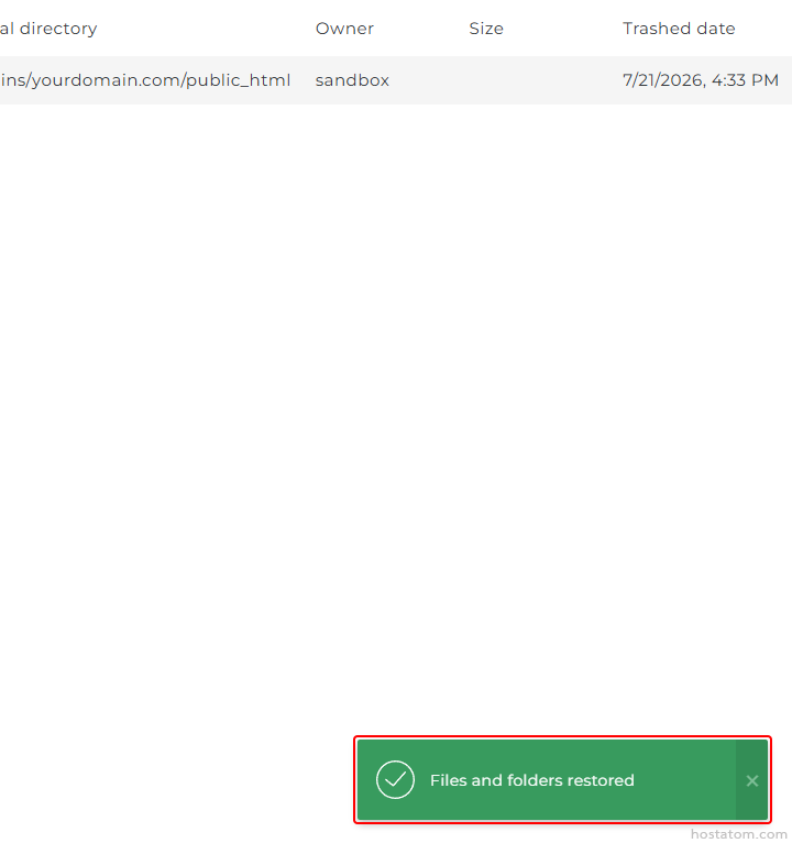 Green bottom-right success toast reading 'Files and folders restored' with a checkmark icon, indicating restoration completed.