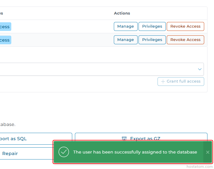 Green success toast: a checkmark icon and message, “The user has been successfully assigned to the database.”